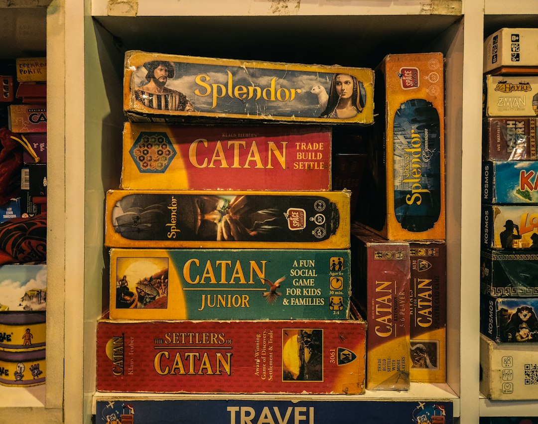 wooden game box on shelf — photo by Zoshua Colah on Unsplash